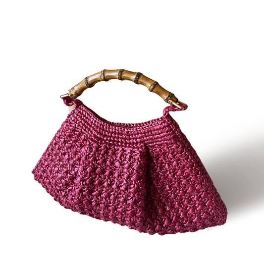 Piccola in burgundy with bamboo handle - a premium straw bag.